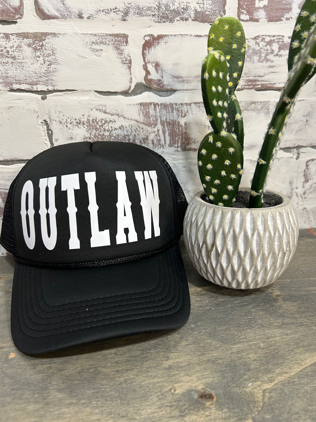 Black Outlaw Trucker Hat