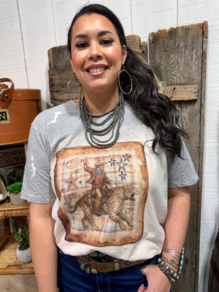 Cowboy Riding Cheetah Western Graphic Tee | Vintage Cowgirl Rodeo T-Shirt