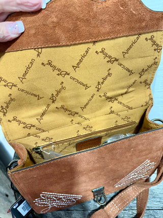Inside of 
American Darling Rough Out Suede Western Crossbody Bag – Tooled Leather Accent Flap Purse