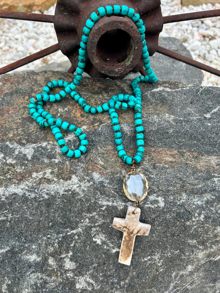 Long Turquoise Necklace With Carved Antler Cross Pendant