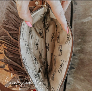 Inside of Vegas NFR Vintage Buckle Cowhide Crossbody Bag – Western Tooled Leather Fringe Purse with Adjustable Strap & Clutch Option