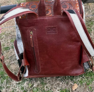 Back of Vintage NFR Buckle Cowhide Backpack – Western Tooled Leather Laptop Backpack/ Diaper Bag with Conceal Carry Pocket & Genuine Cowhide