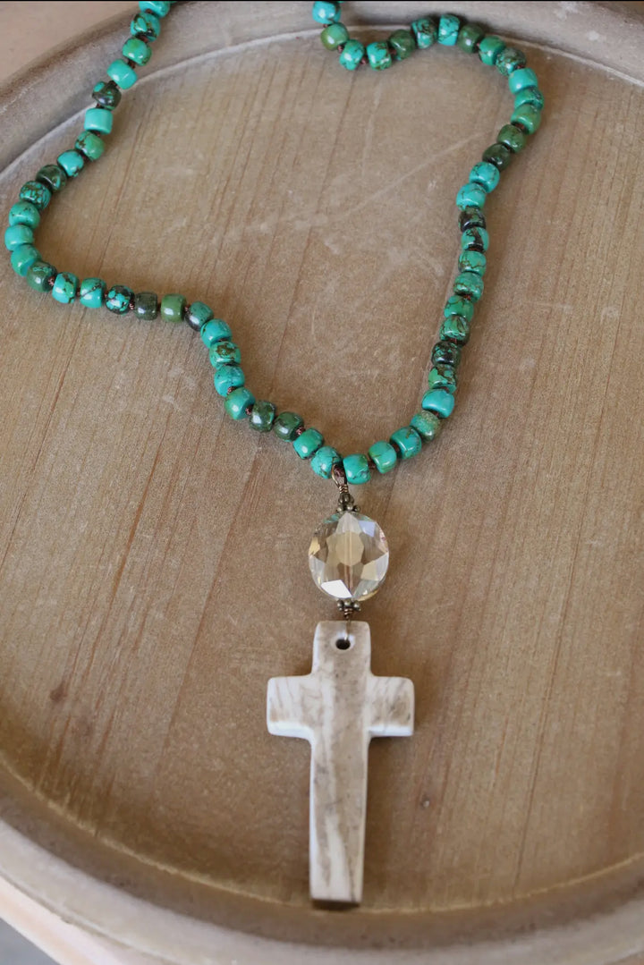 Long Turquoise Necklace With Carved Antler Cross Pendant