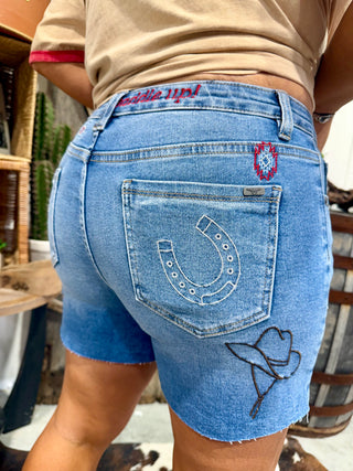 Back view Western Embroidered Stretch Denim Shorts – Mid Wash Cowgirl Shorts with Tummy Control & Frayed Hem- Lucky & Blessed 