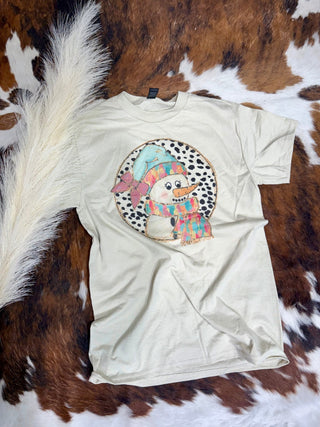 Tan Pastel Snowman Christmas Tee – Dalmatian Print Holiday Graphic Shirt - Barbwire n Bougie Boutique
